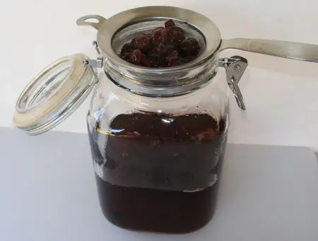 Straining the Blueberry Liqueur