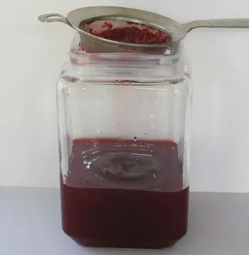 Straining the Raspberry Liqueur